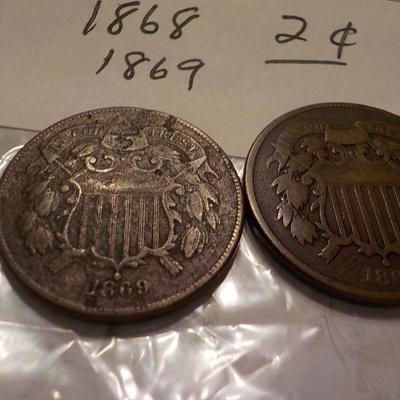 1868 - 2 cent coin and 1869 - 2 cent coin.