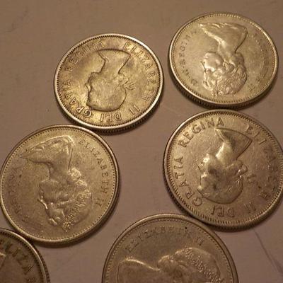 1965, 1960 Canadian quarters plus 2 centennial 1967 quarters.