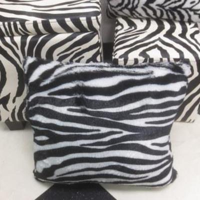 Lot 197 - Zebra Print Pillow Group &  Square Ottoman Containers