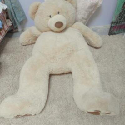 Lot 643 - Costco brand Large Floppy Teddy Bear and Pink Pillow