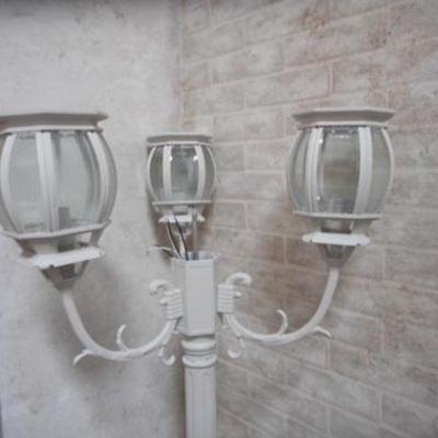 Lot 646 - 5 foot 5 inches tall Three Armed Lamp 