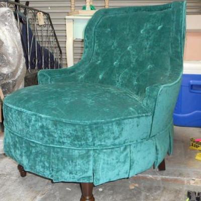 Lot 667 - Teak Colored Upholstered Tuffed Chair