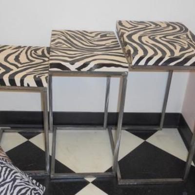 Lot 681 - Zebra Themed Nesting Tables, Vanity Chair & Footstools