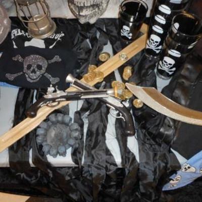 Lot 684 - Pirates Lot of Goodies & Costumes & Props