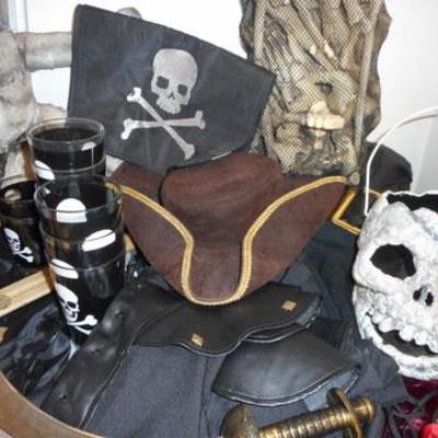 Lot 684 - Pirates Lot of Goodies & Costumes & Props