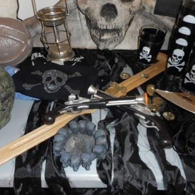 Lot 684 - Pirates Lot of Goodies & Costumes & Props