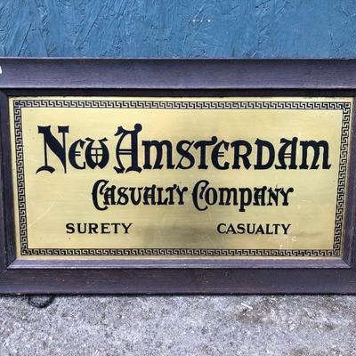 #67 - Vintage New Amsterdam Casualty Company Framed Brass Sign 