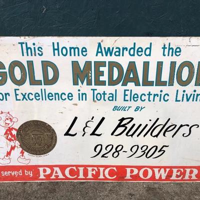 #114 - Vintage L&L Builders Gold Medallion Cardboard Sign