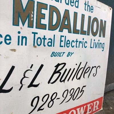 #114 - Vintage L&L Builders Gold Medallion Cardboard Sign