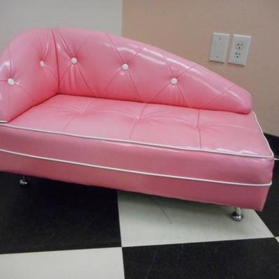 Lot 635 - Youth Size Pink Pleather Lounging Couch