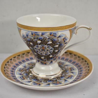 Tea Cup and Saucer by Grace's Teaware. Saucer is Chipped