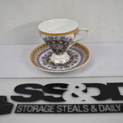 Tea Cup and Saucer by Grace's Teaware. Saucer is Chipped