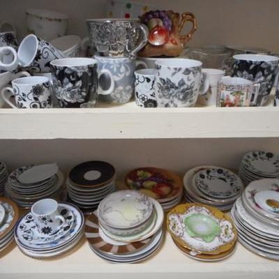 Lot 829 - Shelves Full of Glassware Lots of teacups 