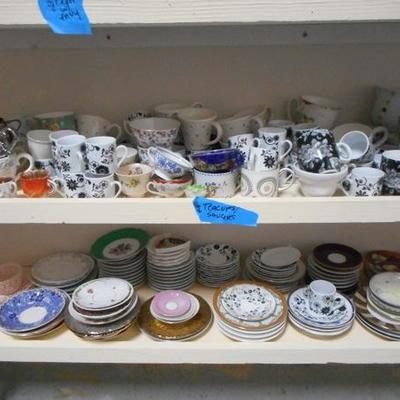 Lot 829 - Shelves Full of Glassware Lots of teacups 