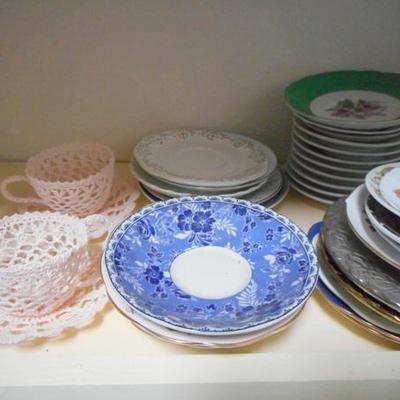 Lot 829 - Shelves Full of Glassware Lots of teacups 