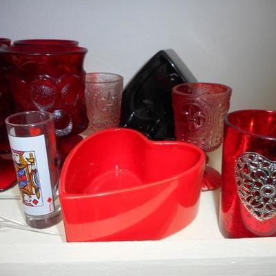 Lot 830 - Shelves Full of Glassware Teapots Planters Red Glass