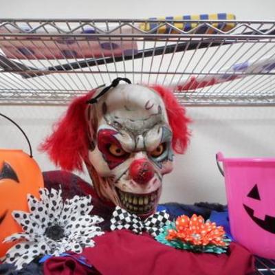 Lot 412 - Halloween Items w/ Psycho Clowns & Metro Rack Included