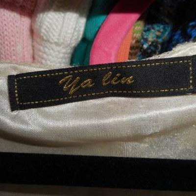 Lot 416 - Womens Clothing + Extendable Rolling Clothes Rack