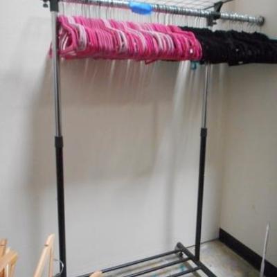 Lot 423 - Rolling Extendable Clothes Rack w/ Hangers