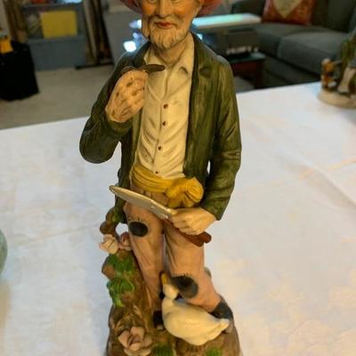 Porcelain man with duck 