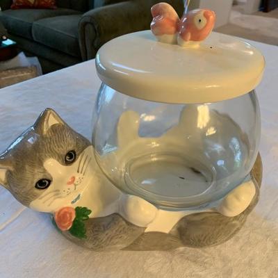 Cat with fishbowl jar