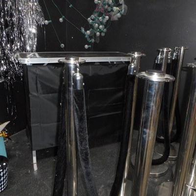 Lot 845 - 12 Stainless Steel Crowd Dividers + Hollywood Themed Items