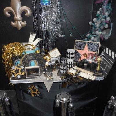 Lot 845 - 12 Stainless Steel Crowd Dividers + Hollywood Themed Items