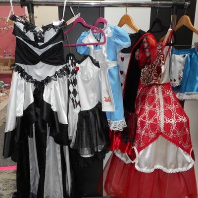 Lot 847 - Alice In Wonderland Costumes + Extendable Clothes Rack
