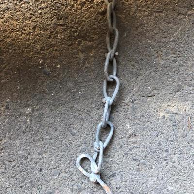 Spools of Chain and Barbed Wire