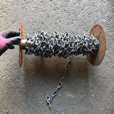 Spools of Chain and Barbed Wire