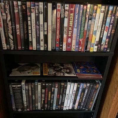  two shelf dvd lot 