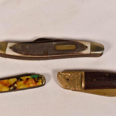 Lot 24:  Lot of three vintage pocket knives 