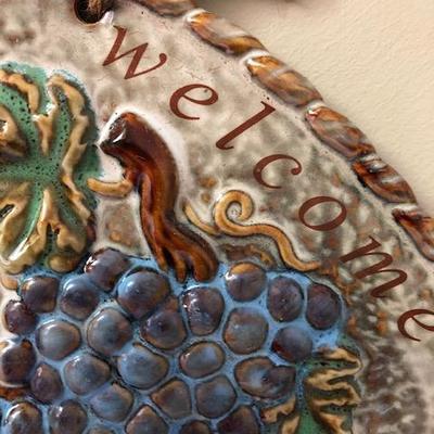 Welcome sign with grapes
