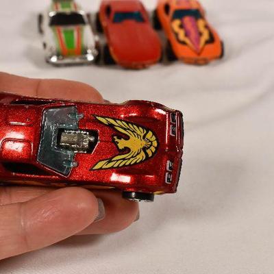 Lot 69: Lot of vintage Hot Wheels toy cars includes a Redline ! 