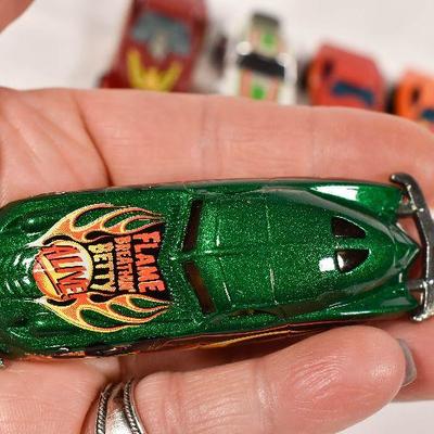 Lot 69: Lot of vintage Hot Wheels toy cars includes a Redline ! 