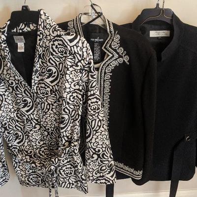 There is a large selection of women's business attire. 
