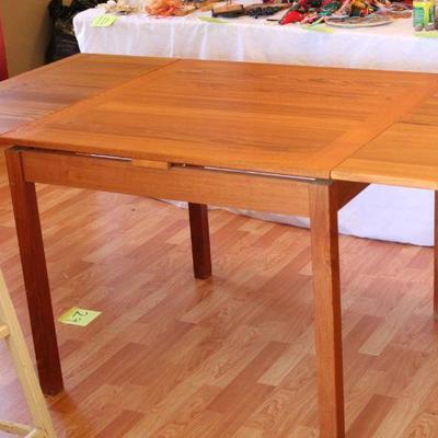 Lot 29 Teak Draw leaf Dining Table