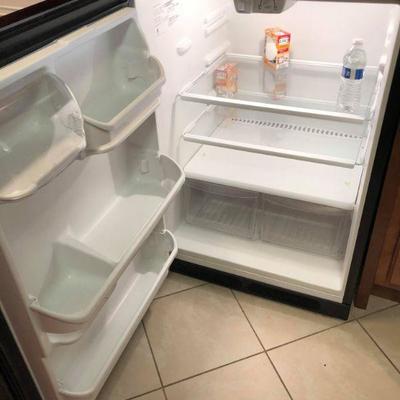 Lot 79 Black Kenmore Refrigerator