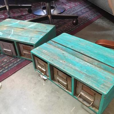Lot 77  Pair of green rustic wood and metal shelves with drawers