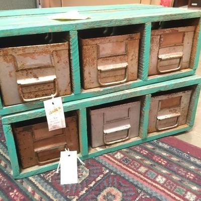 Lot 77  Pair of green rustic wood and metal shelves with drawers