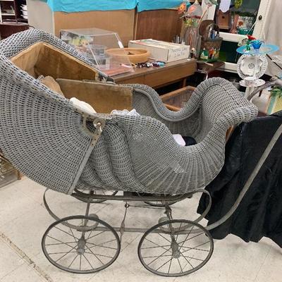 Early 1900â€™s wicker baby carriage 