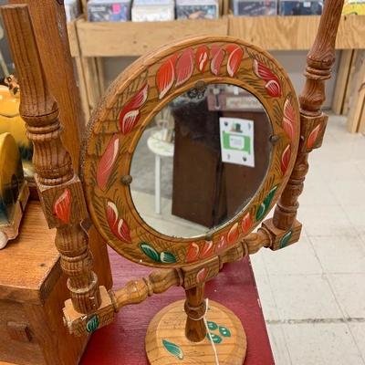 Small mirror on stand 