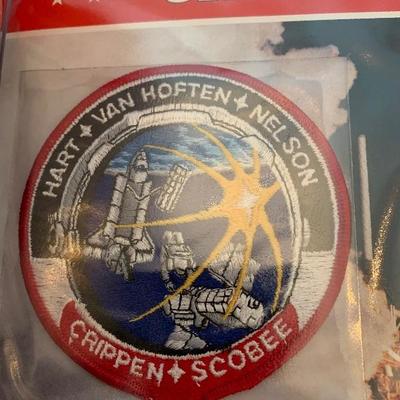 Two albums full of NASA space mission patches