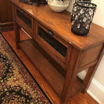 sofa table with two drawers and shelf below
