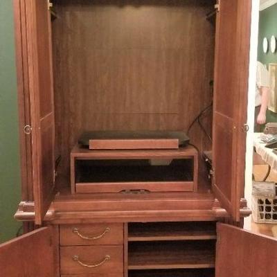 Lot #9  Handsome Entertainment Center with Storage