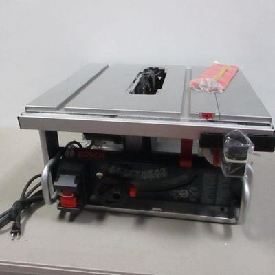 Lot 24 - Bosch Table Saw Model # GTS 1031