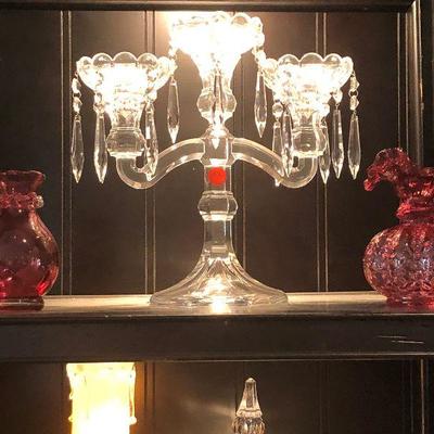 Candlesticks and cranberry glass