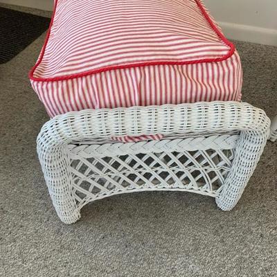 White painted wicker arm chair with ottoman