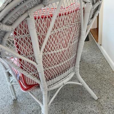 White painted wicker arm chair with ottoman