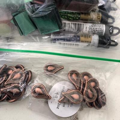 Lot of craft rocks and metal items 